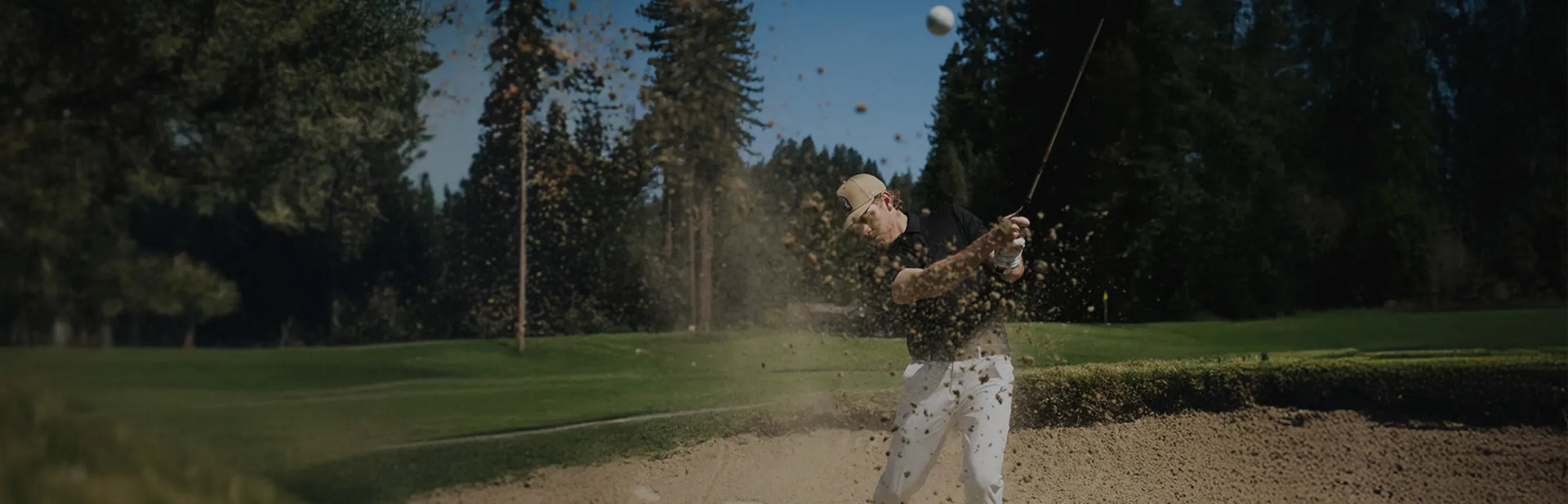 man wearing a white glove holding a blue belt