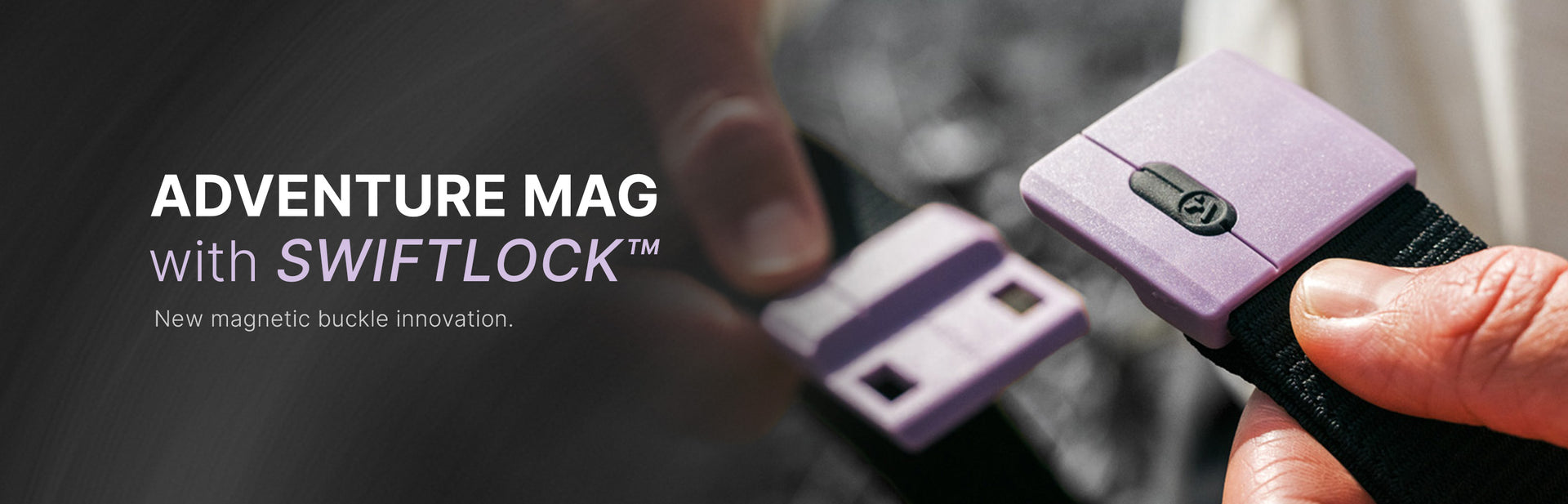 Close-up of hands holding a black strap with a purple magnetic buckle labeled ADVENTURE MAG with SWIFTLOCK™. New magnetic buckle innovation on the left side of the image.