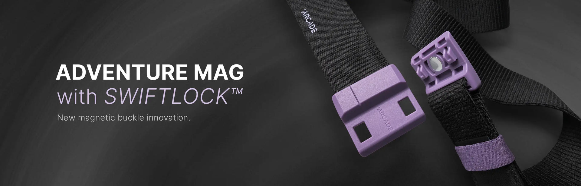 Close-up of a black strap belt with a purple magnetic buckle labeled Arcade. Text reads: “ADVENTURE MAG with SWIFTLOCK™. New magnetic buckle innovation.” The background is dark and sleek.