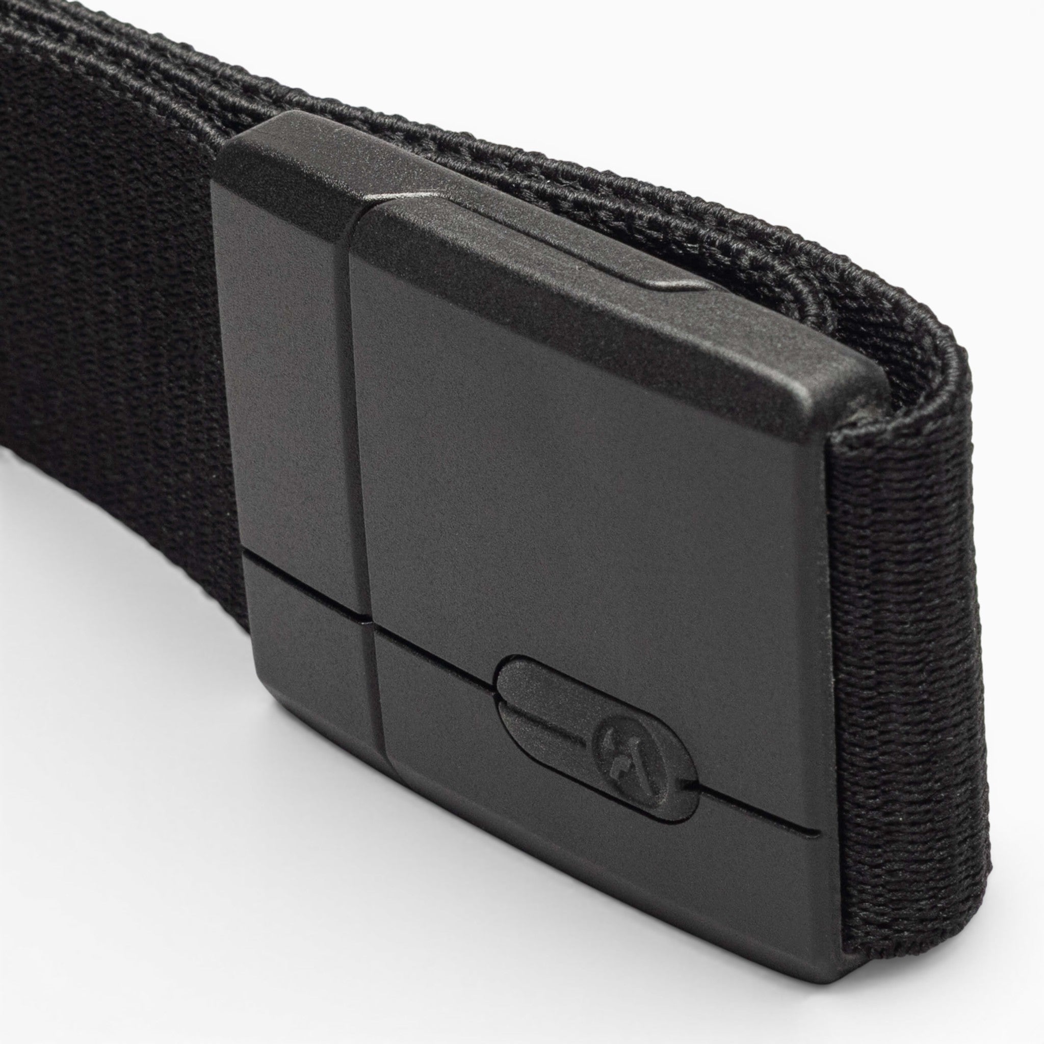 A close-up view of the Arcade Belts Aero Mag, a black fabric belt with a durable rectangular buckle, displayed against a plain white background.
