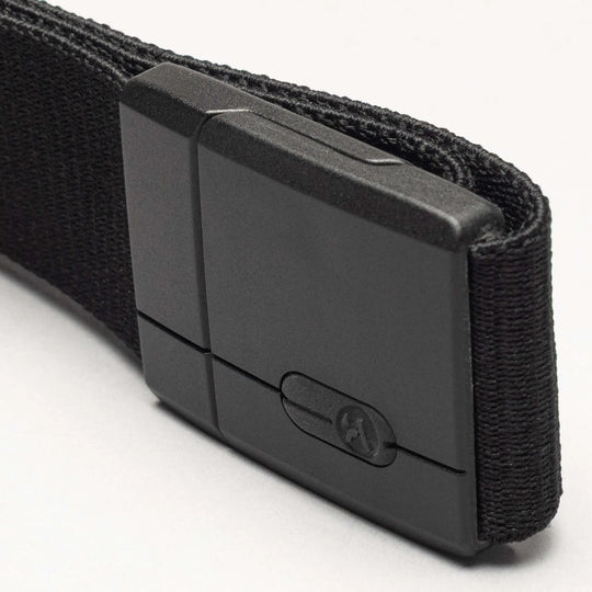 A close-up of the Arcade Belts Aero: a durable black fabric belt with a rectangular matte black plastic buckle featuring SwiftLock technology, shown against a light background.