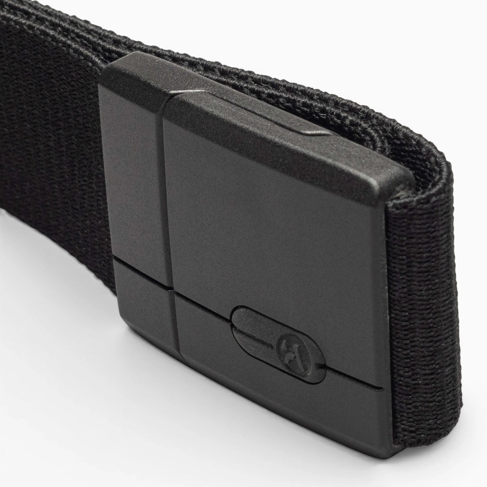 A close-up view of the Arcade Belts Aero Mag, a black fabric belt with a durable rectangular buckle, displayed against a plain white background.