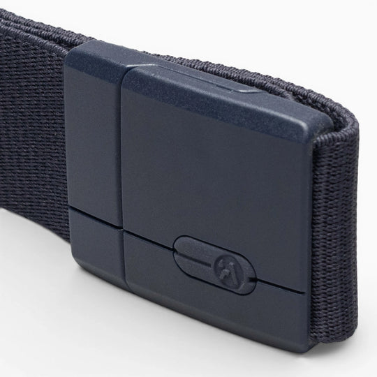 A close-up of the Aero Mag by Arcade Belts, featuring a durable black rectangular buckle attached to a woven black belt, set against a white background.