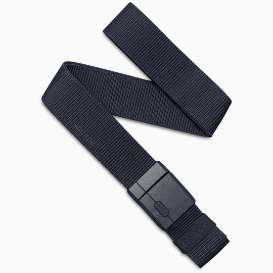 The Mag Kit by Arcade Belts is a black nylon stretch belt with a textured pattern and a rectangular SwiftLock buckle, displayed in a loose zigzag shape on a white background.