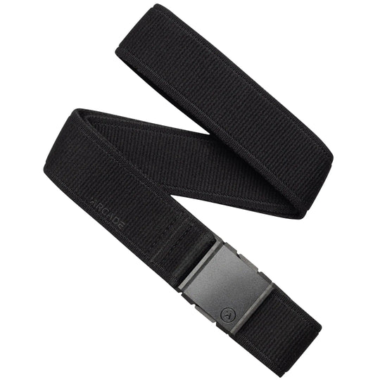The black Atlas belt by Arcade Belts features a fabric strap, a rectangular black plastic buckle, and subtle ARCADE embossing near the buckle, making it a stylish and practical choice for travel.