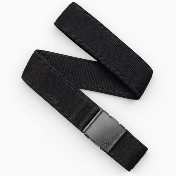 The Atlas belt by Arcade Belts features black stretch webbing for comfort, a rectangular plastic buckle, and a subtle ARCADE emboss near the buckle, emphasizing its simple, minimalist design.