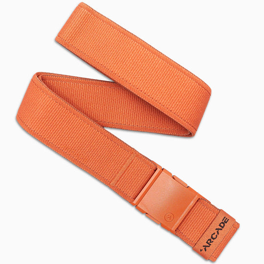An orange Atlas stretch webbing belt from Arcade Belts, featuring a matching plastic buckle and the brand name printed in black near the end, shown against a white background.