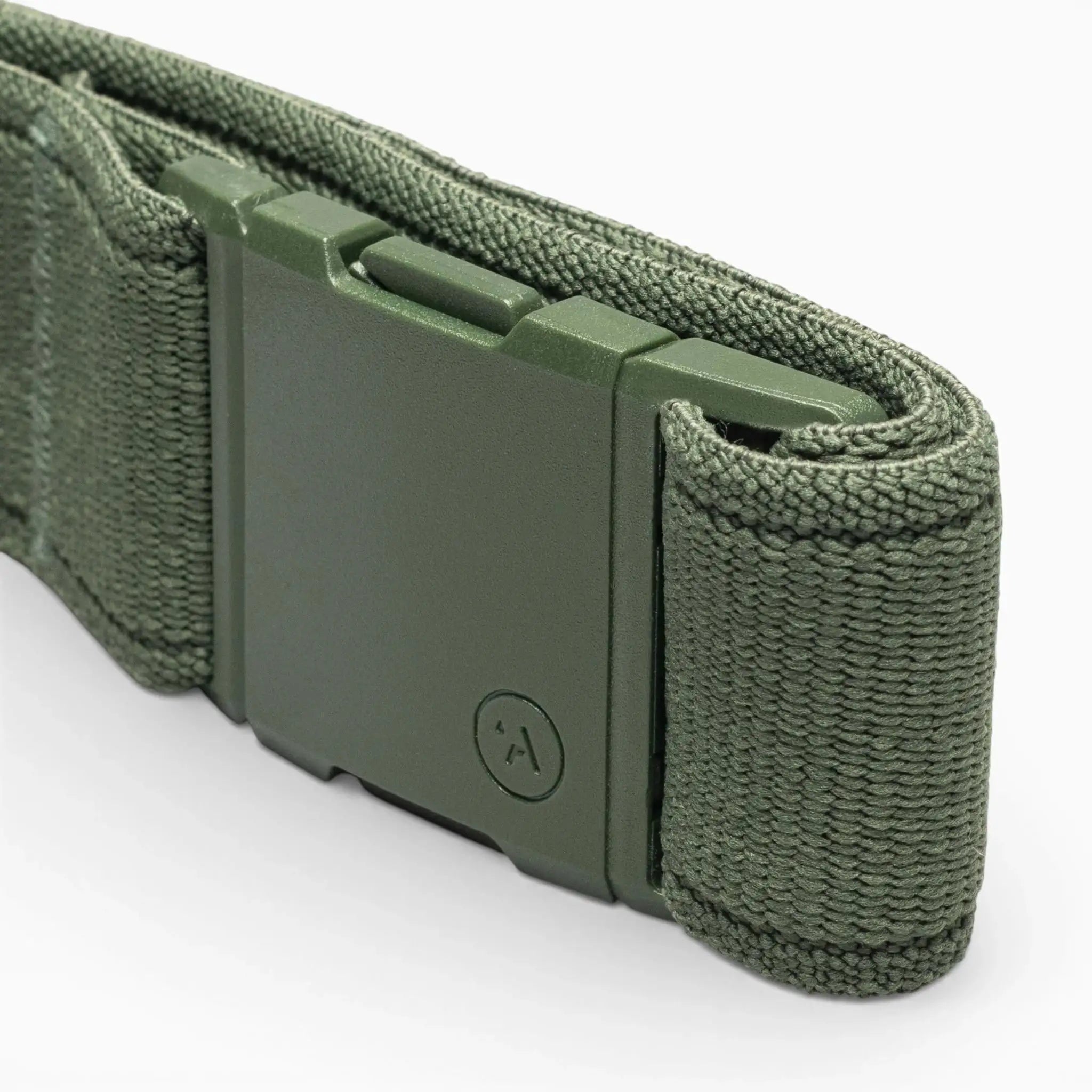 Close-up of the Atlas adventure belt by Arcade Belts in olive green, featuring a matte green A2 buckle and a small embossed circular logo on the end, set against a plain light background.