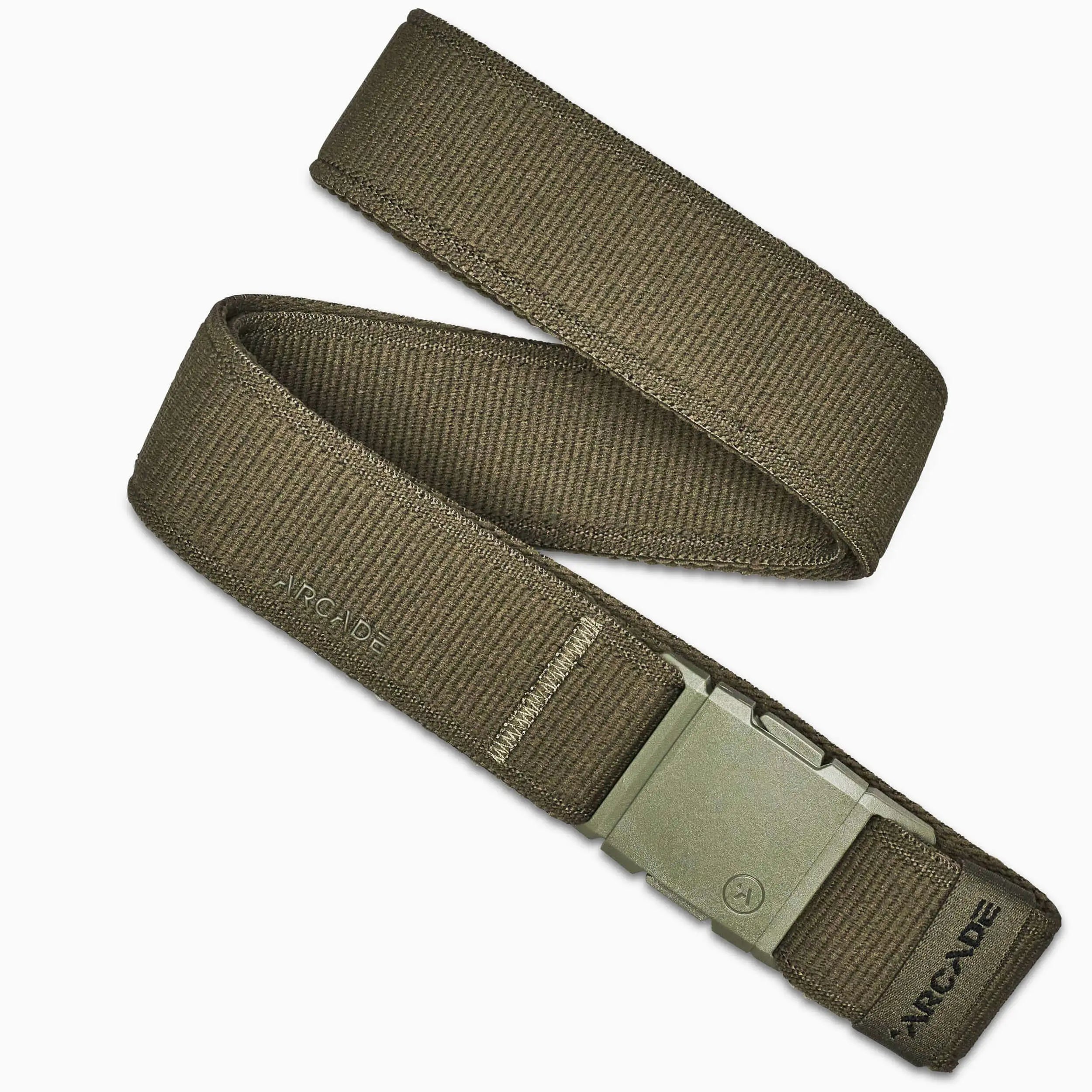 The Atlas by Arcade Belts is a khaki green woven belt with a rectangular plastic buckle, partially looped, and the brand name visible on the tip. Made from durable stretch webbing for all-day comfort.