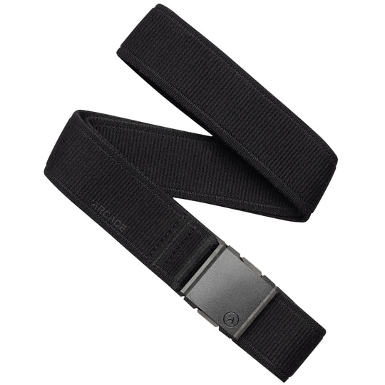 The Atlas Long Kit by Arcade Belts is a black elastic stretch belt with a rectangular black buckle, partially coiled and featuring a subtle “ARCADE” logo near the buckle—ideal for travel and daily comfort.