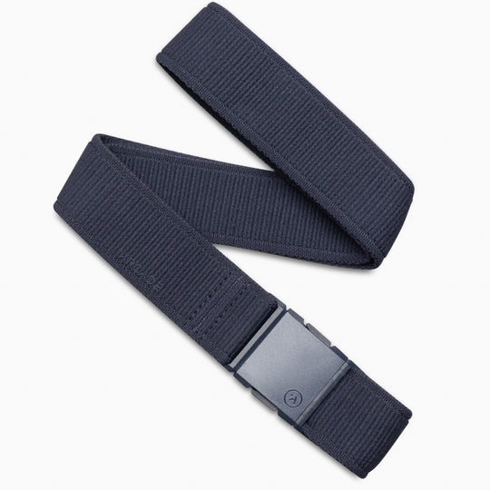 The Atlas belt by Arcade Belts in navy blue features a rectangular plastic buckle, displayed in a loose zigzag shape on a white background.