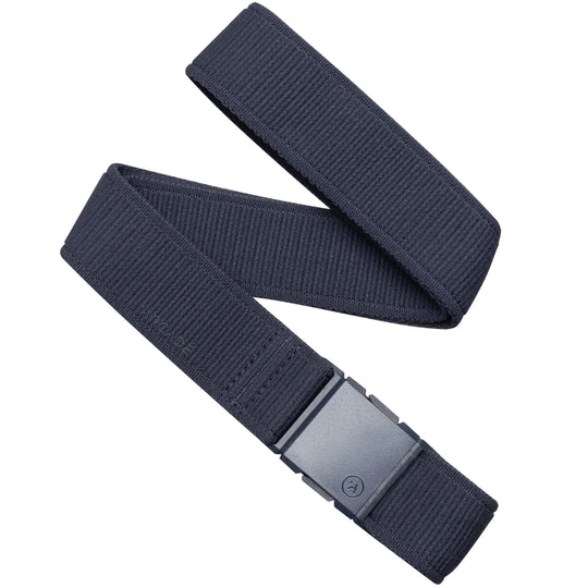 The Arcade Belts Atlas Long Kit is a dark navy blue elastic stretch belt with a rectangular plastic buckle, shown coiled loosely on a white background.