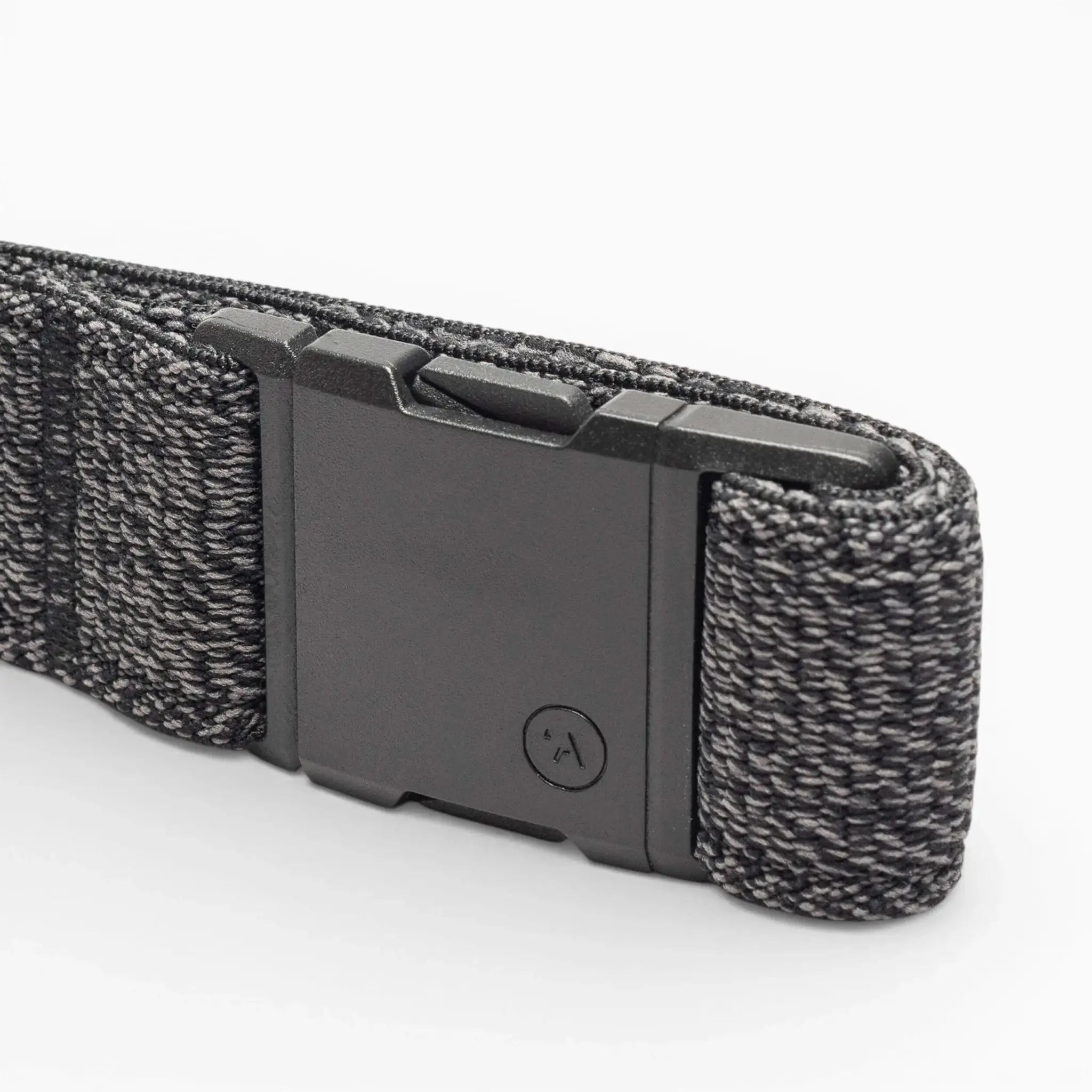 A close-up of the black and gray Atlas Low Profile Belt by Arcade Belts with a rectangular plastic buckle, displayed on a white background—ideal for travel belt enthusiasts.