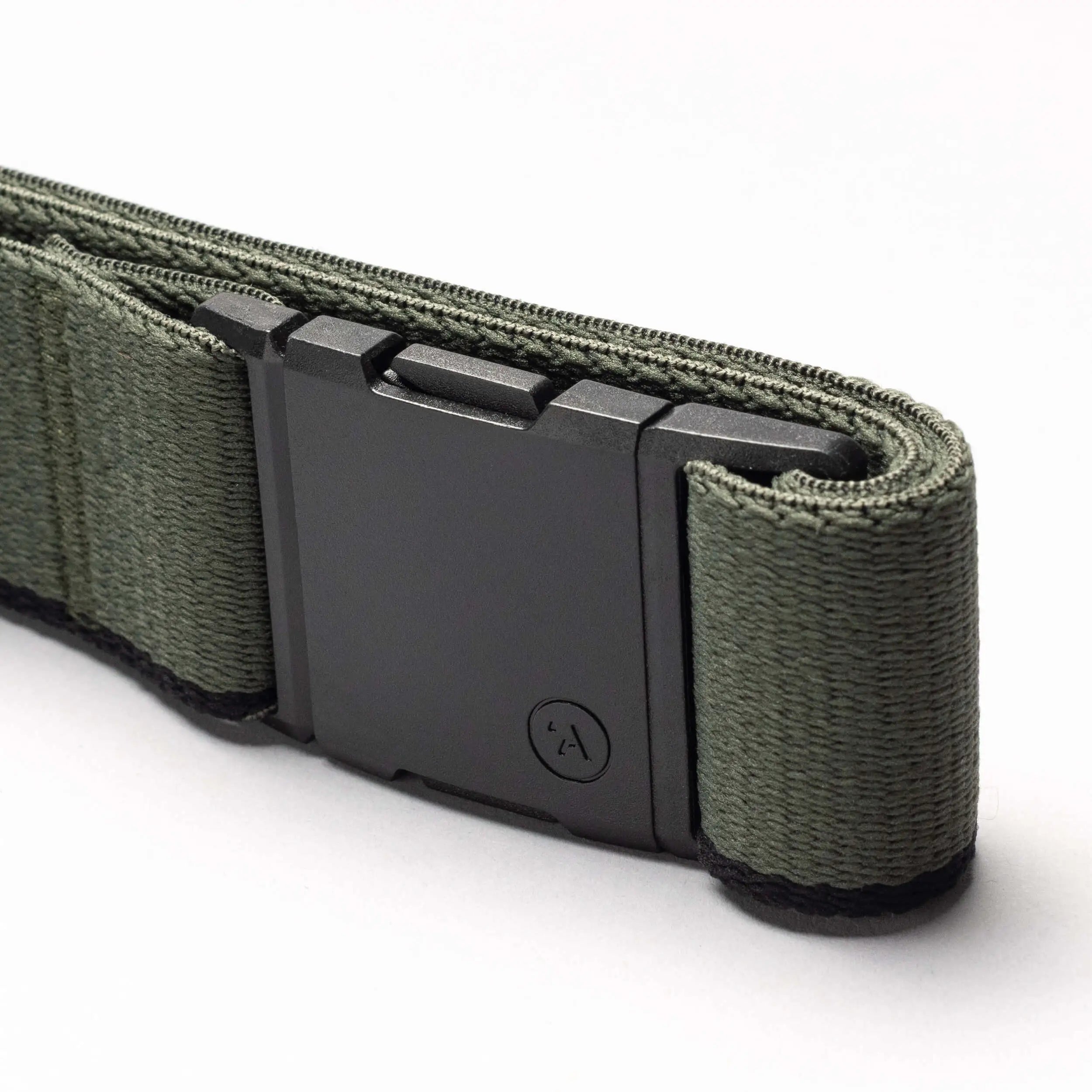 A close-up of the Arcade Belts Blackwood belt in green, featuring a sleek matte black A2 buckle, set against a white background.