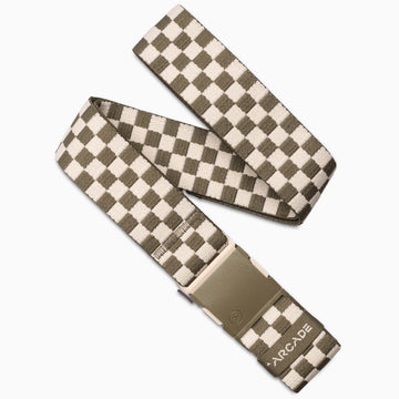 The Arcade Belts Check is a beige and brown checkerboard belt with a rectangular tan plastic buckle and "ARCADE" printed near the end. Its performance stretch design ensures comfort and flexibility for daily wear.