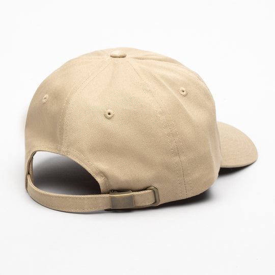 The Arcade Dad Hat by Arcade Belts is shown from the back, highlighting its fabric strap with a metal buckle for adjustable sizing, offering a secure fit like an Elastic Stretch Belt, set against a plain white background.