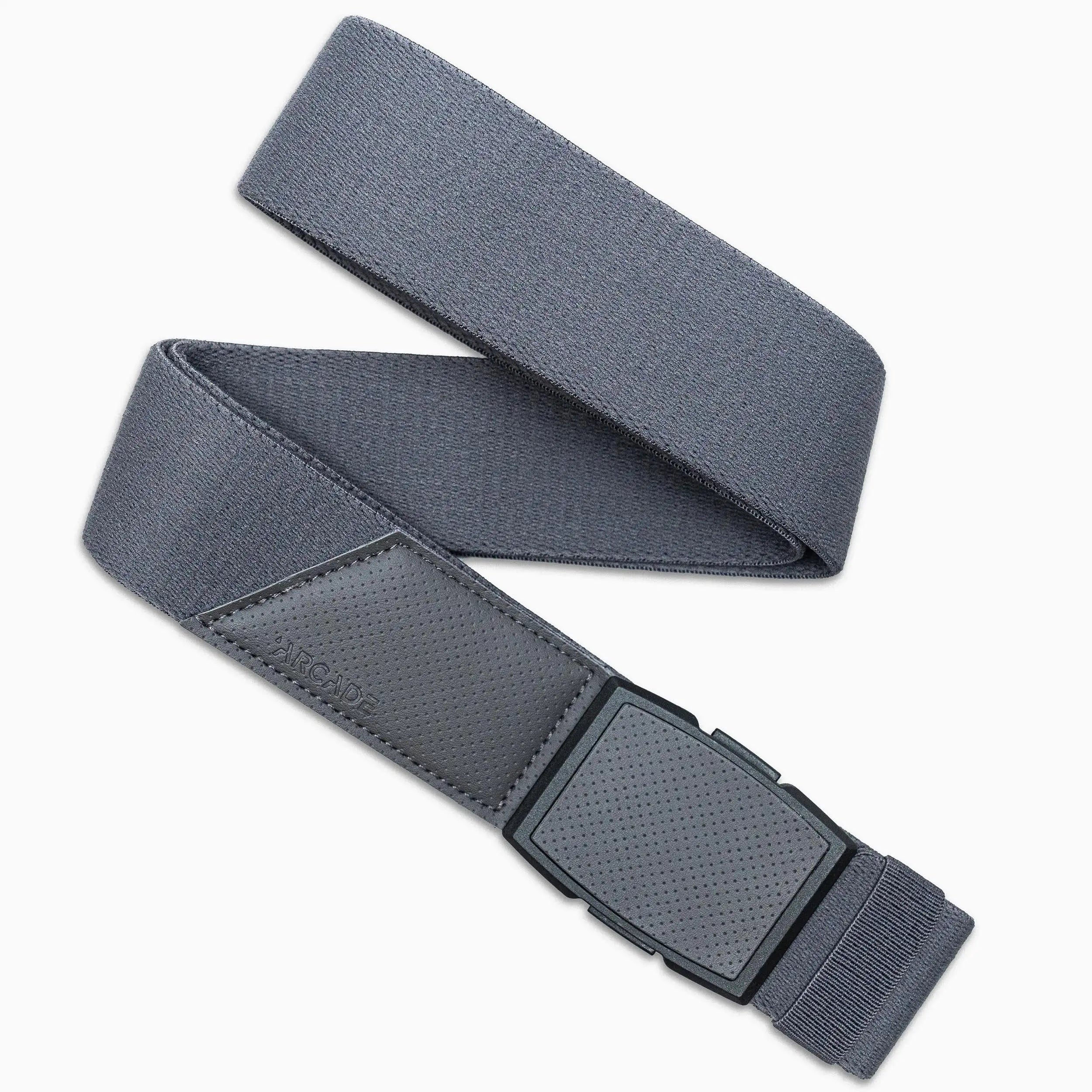 The Arcade Belts Elevation is a gray belt with a rectangular, textured plastic buckle, displayed in a loose zigzag on a white background. This low profile belt blends style and comfort for everyday wear.