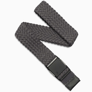 The Arcade Belts Futureweave is a charcoal woven webbing belt featuring a black rectangular buckle and black leather accents on the ends for a comfortable fit, shown on a white background.