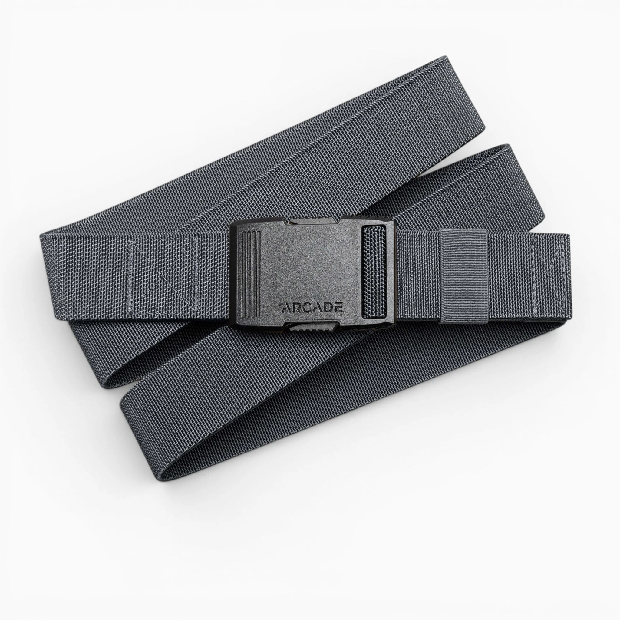 A gray woven Arcade Belts Hardware belt with superior strength and a black ARCADE-labeled plastic buckle is coiled loosely on a white background.