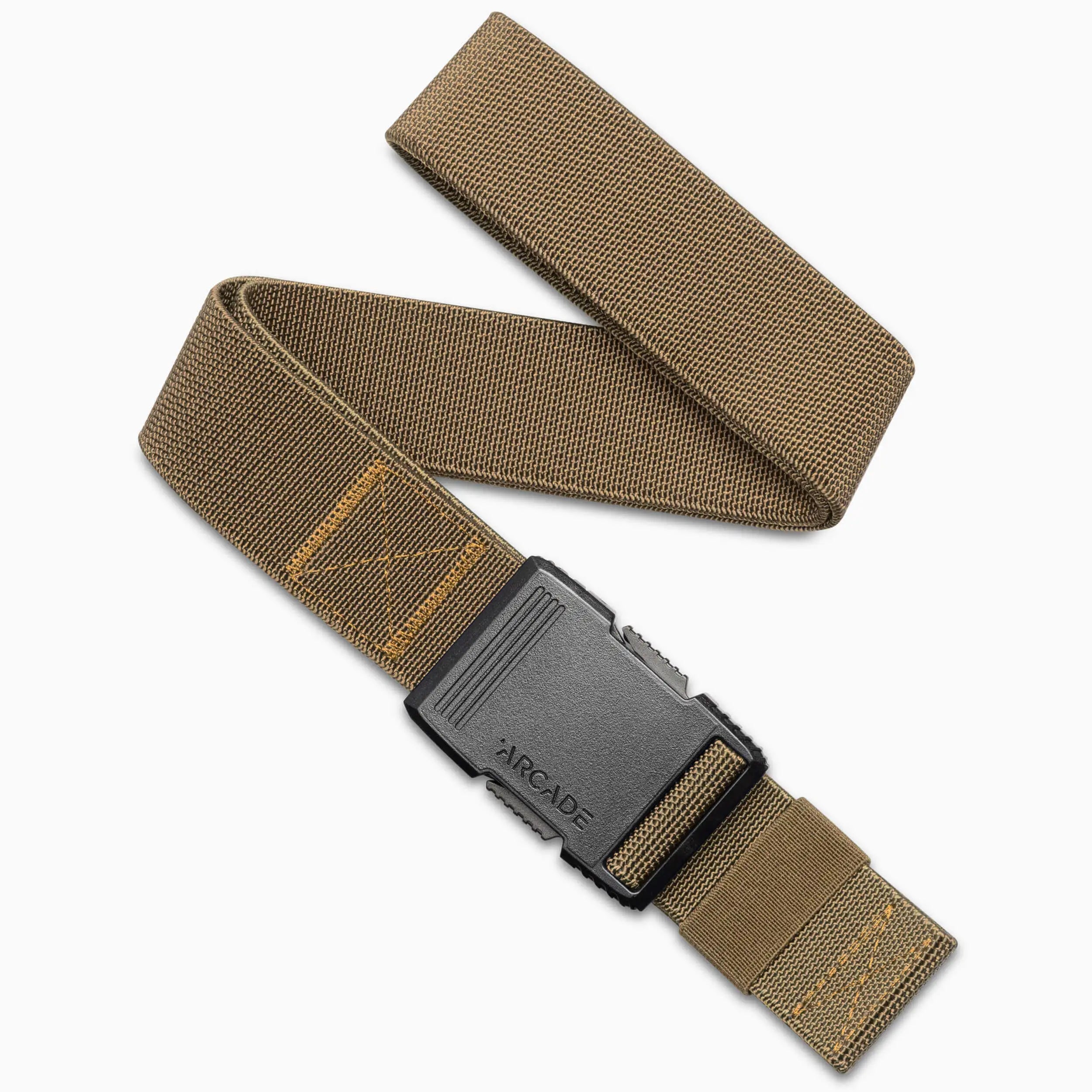 The Arcade Belts Hardware Long Kit, a brown elastic fabric belt with a black plastic buckle embossed with Arcade, is partially coiled and arranged diagonally on a white background.