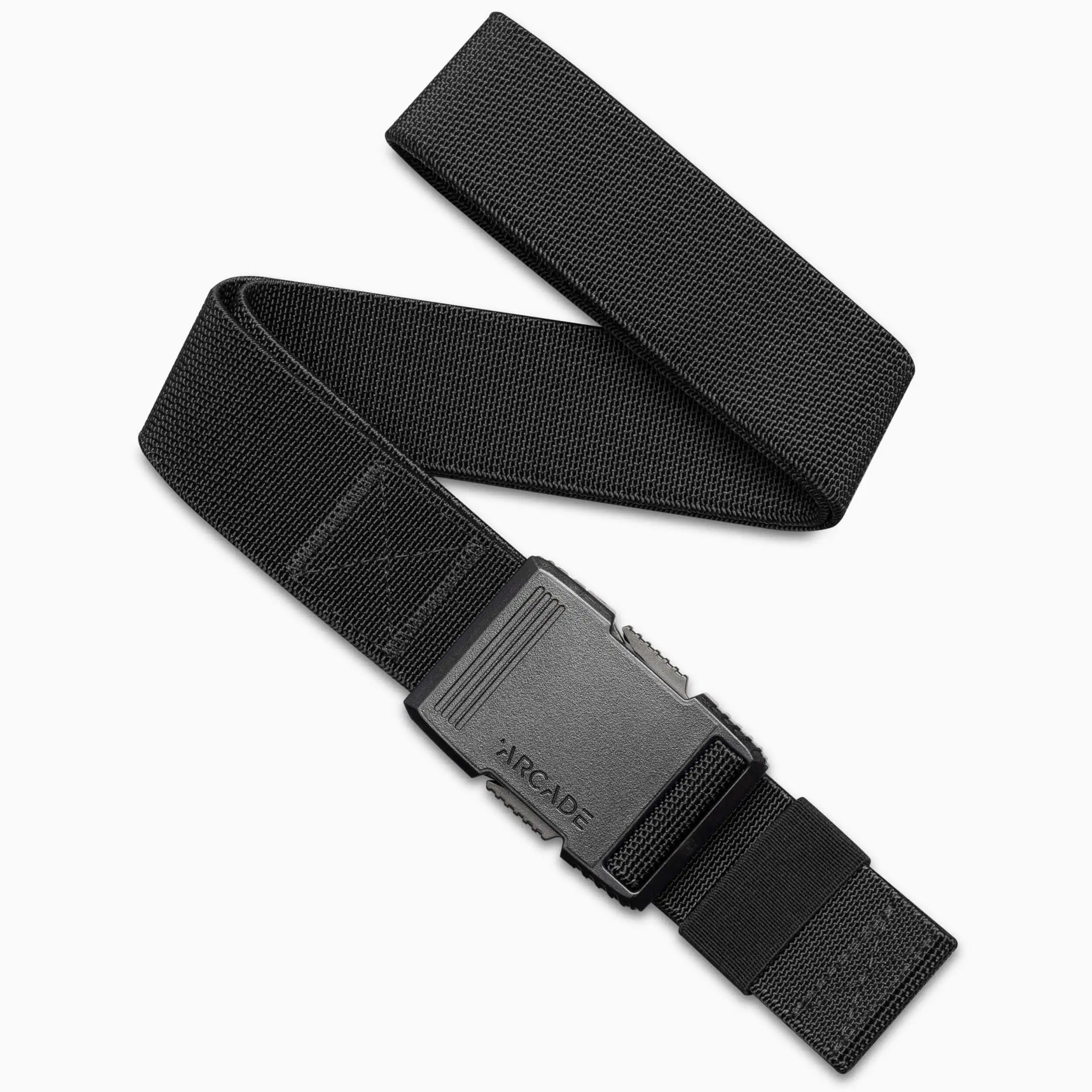 The Arcade Belts Utility Long Kit is a black elastic stretch belt with a rectangular plastic buckle embossed with Arcade, displayed in a loose zigzag shape on a white background.