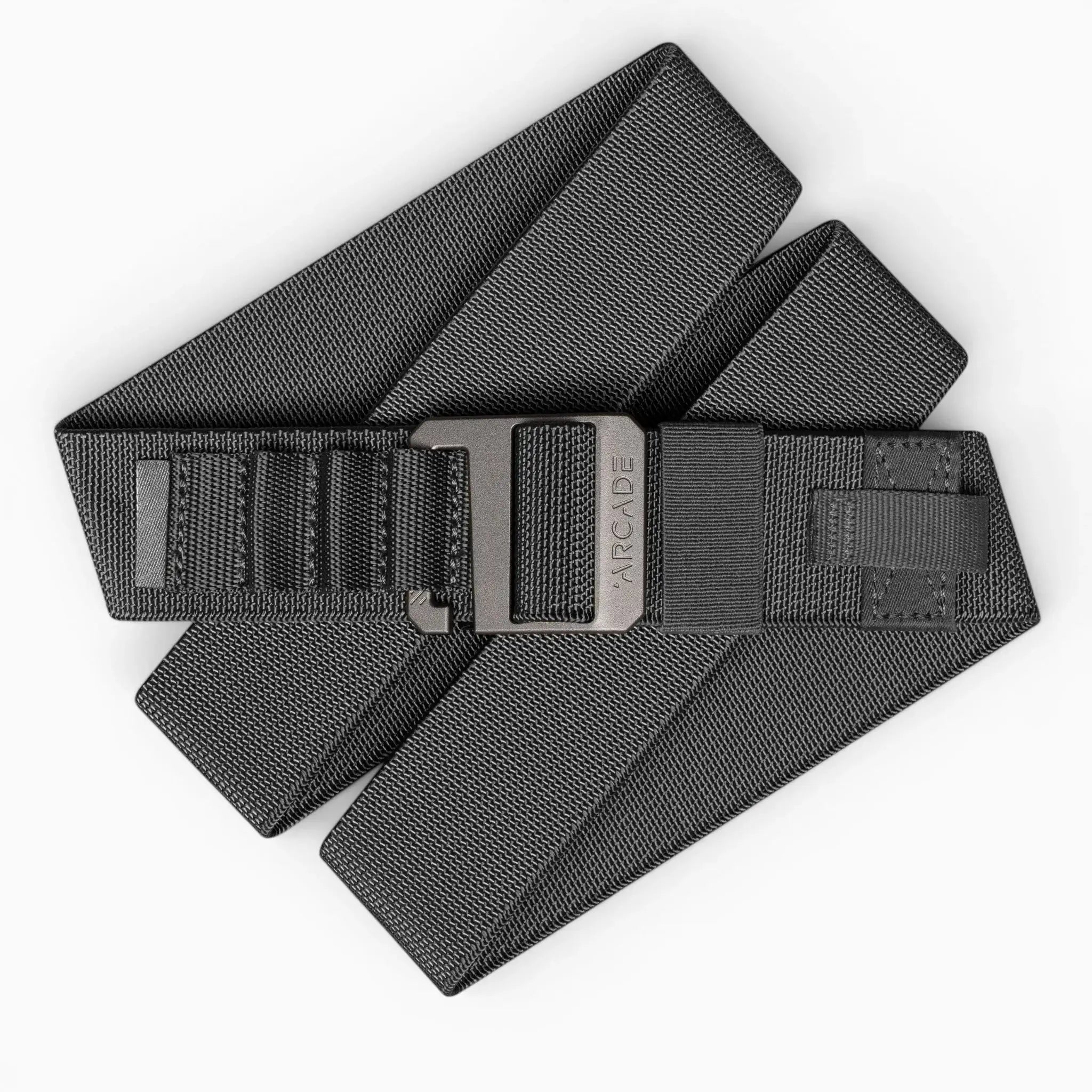 The Hardware Alu by Arcade Belts is a black elastic stretch belt with a matte gray buckle engraved with the Arcade Belts logo, offering style and comfort for everyday wear and travel.