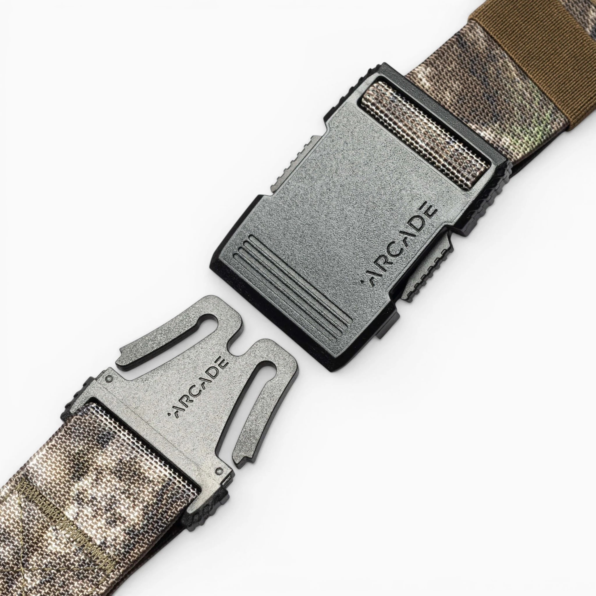 Two segments of the Arcade Belts Hardware low profile belt with a black plastic buckle, both engraved with the Arcade Belts name, are shown against a white background.