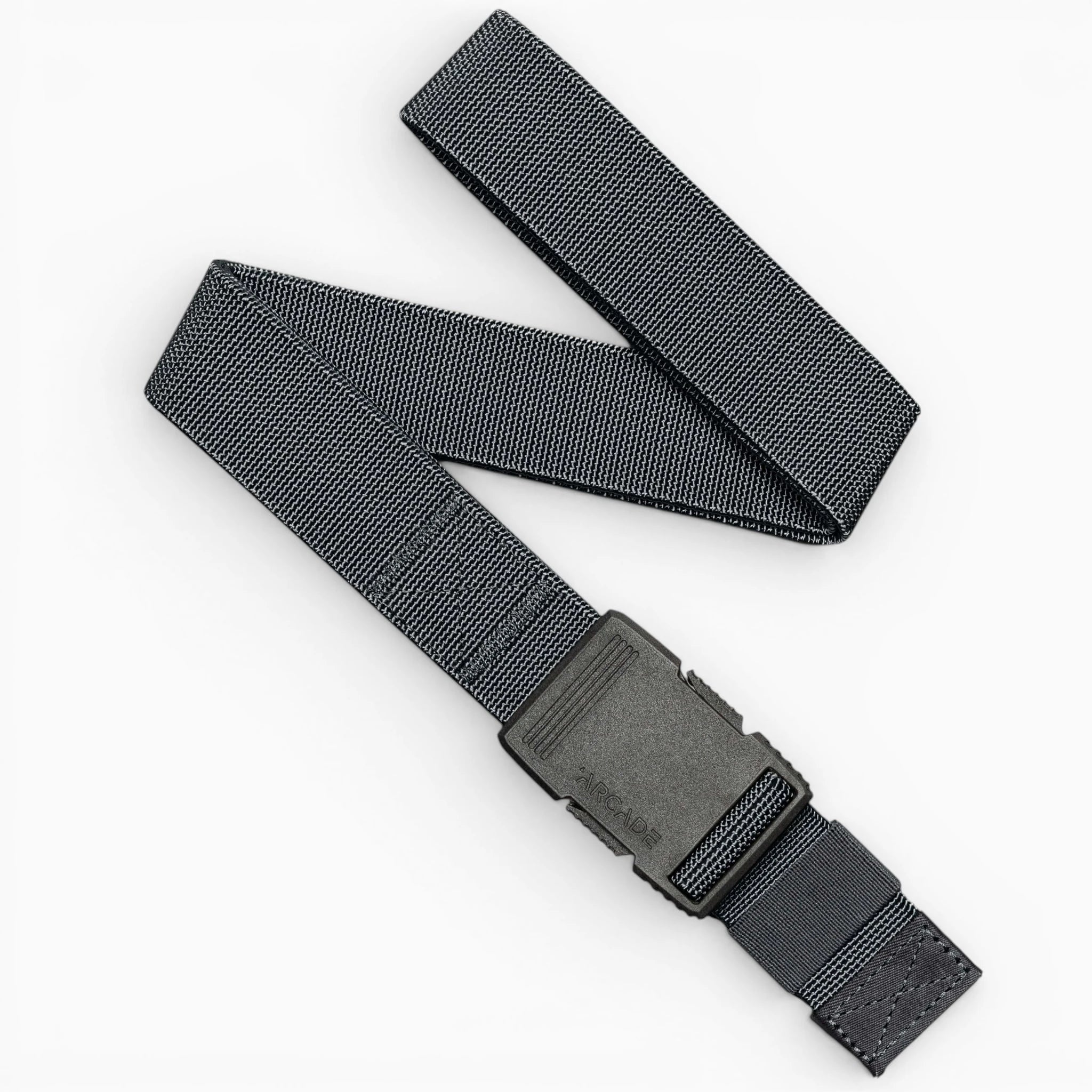 The Arcade Belts Hardware in Charcoal features a durable nylon strap and sturdy plastic buckle, arranged here in a loose zigzag on a white background, providing superior strength for carrying essential tools or gear.