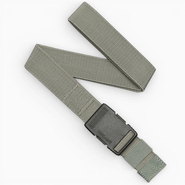 The Arcade Belts Hardware in Sage is a durable nylon belt featuring a black rectangular plastic buckle, laid flat with one end folded over. Designed for superior strength, it's ideal for everyday wear or tactical use.
