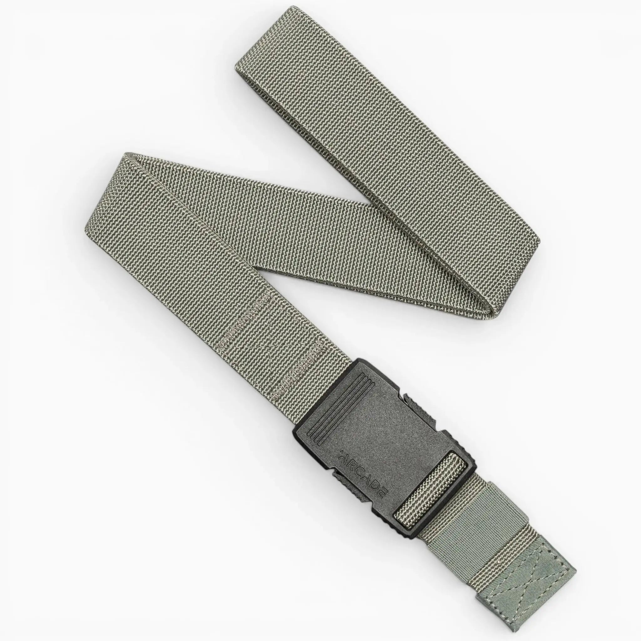 The Arcade Belts Hardware in Sage is a durable nylon belt featuring a black rectangular plastic buckle, laid flat with one end folded over. Designed for superior strength, it's ideal for everyday wear or tactical use.