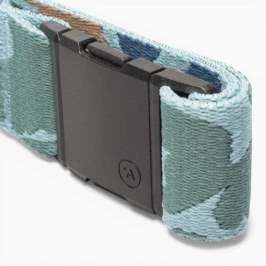 Close-up of the Arcade Belts High Fives Duck Camo belt, featuring a camouflage-patterned fabric and a rectangular black buckle, shown on a white background—a portion of proceeds supports veterans and the High Fives Foundation’s work for athletes.