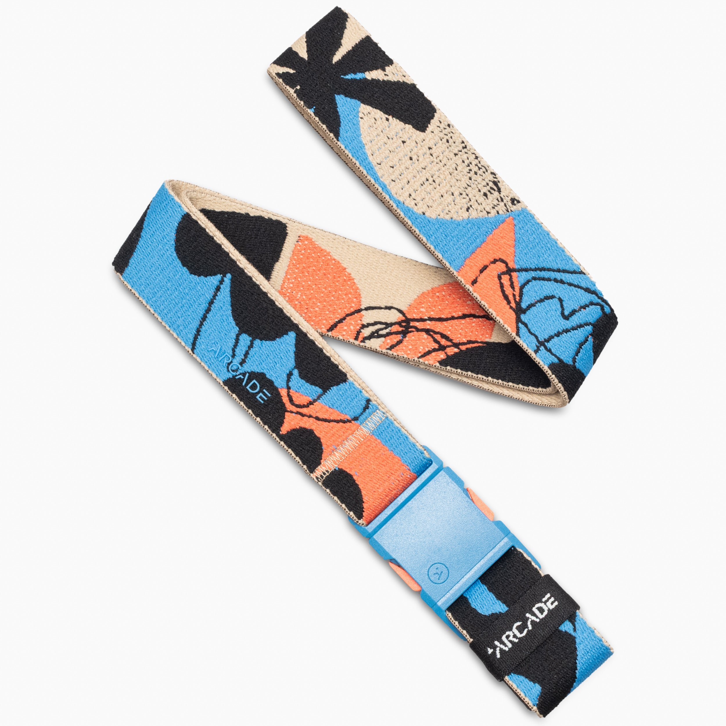 Introducing the Inkstorm belt by Arcade Belts in the color Tide—a vibrant accessory with abstract blue, orange, beige, and black patterns. It features a light blue A2 buckle and “ARCADE” branding on one end. Made from performance stretch webbing, this movement-ready design delivers comfort and flexibility for every adventure.