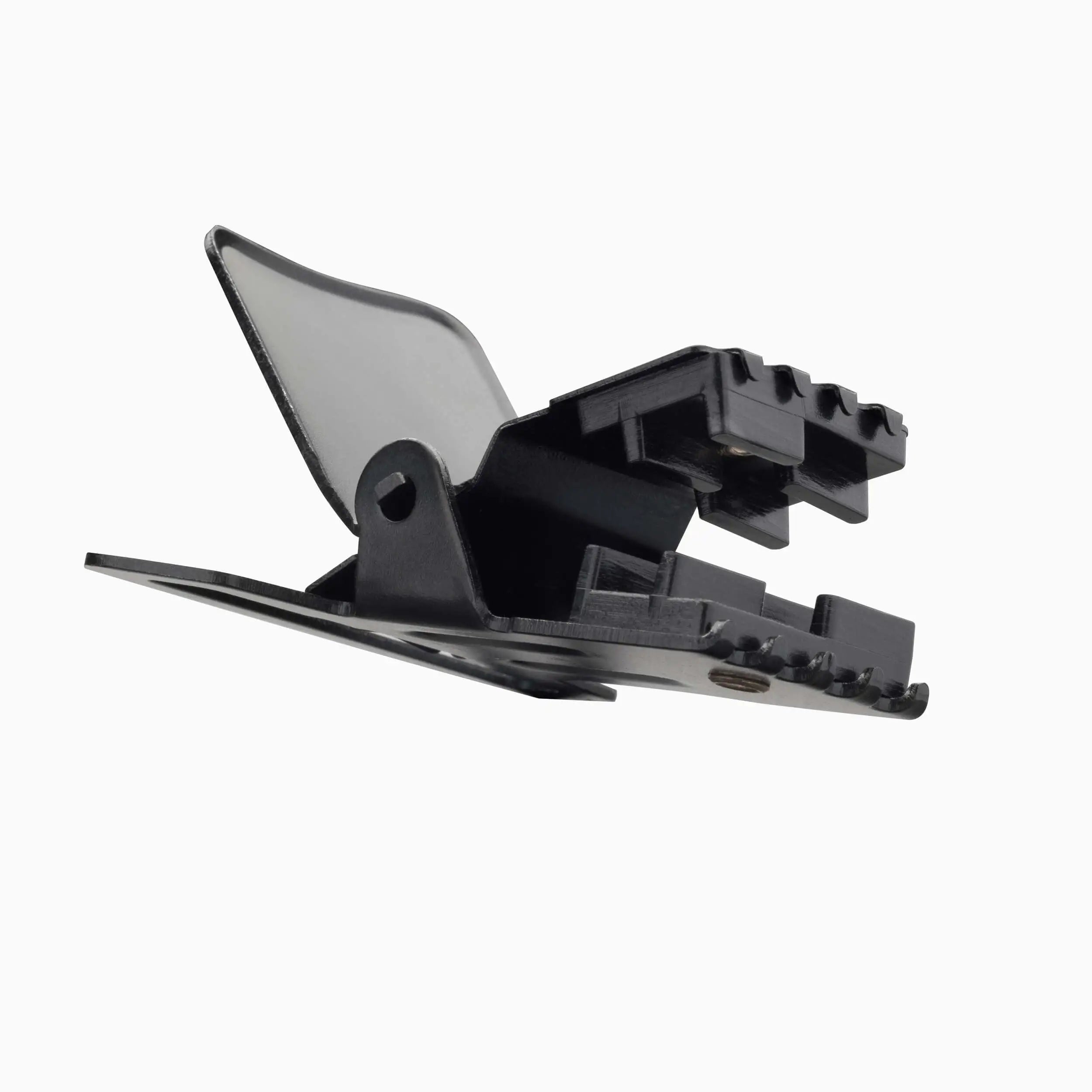 The Jessup by Arcade Belts is a black plastic clip with a serrated grip and hinged lever, resembling those on travel or low-profile belts, shown against a white background.