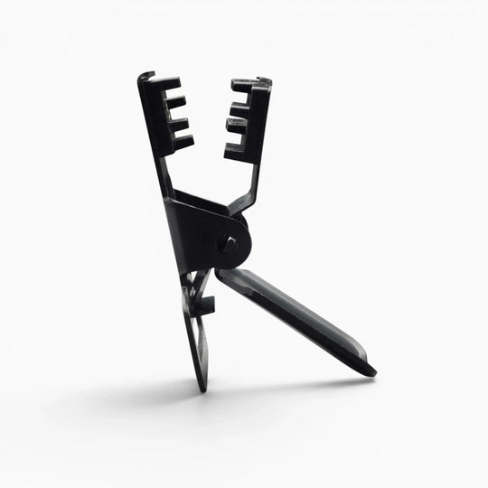 The Jessup by Arcade Belts is a black plastic tool with a handle and two-pronged gripping ends, featuring durable hardware, shown standing on a white background.
