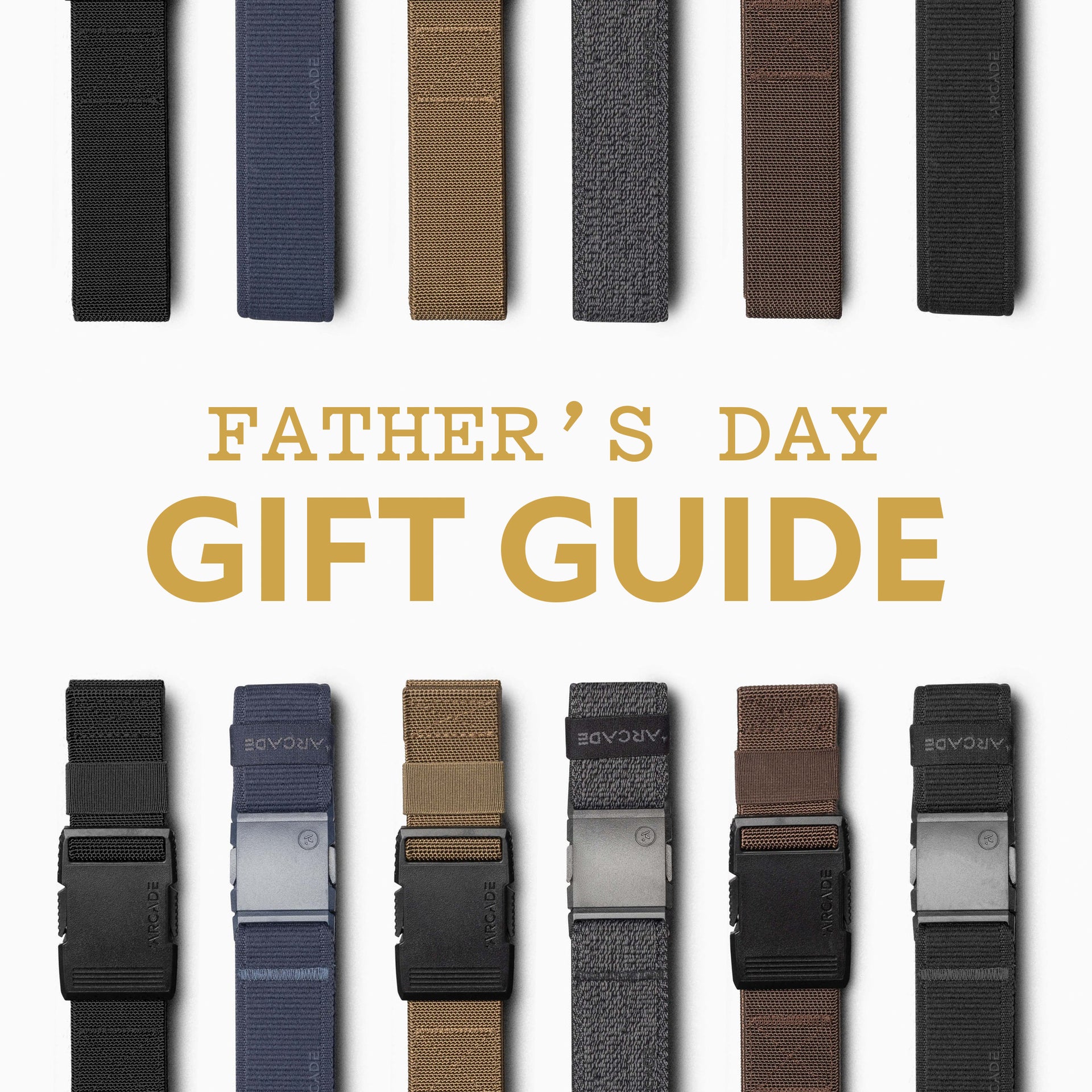 A variety of men’s belts, including Stretch Webbing and Arcade Belts in different colors, are arranged in rows above and below the text Father’s Day Gift Guide in bold, gold and gray lettering on a white background.