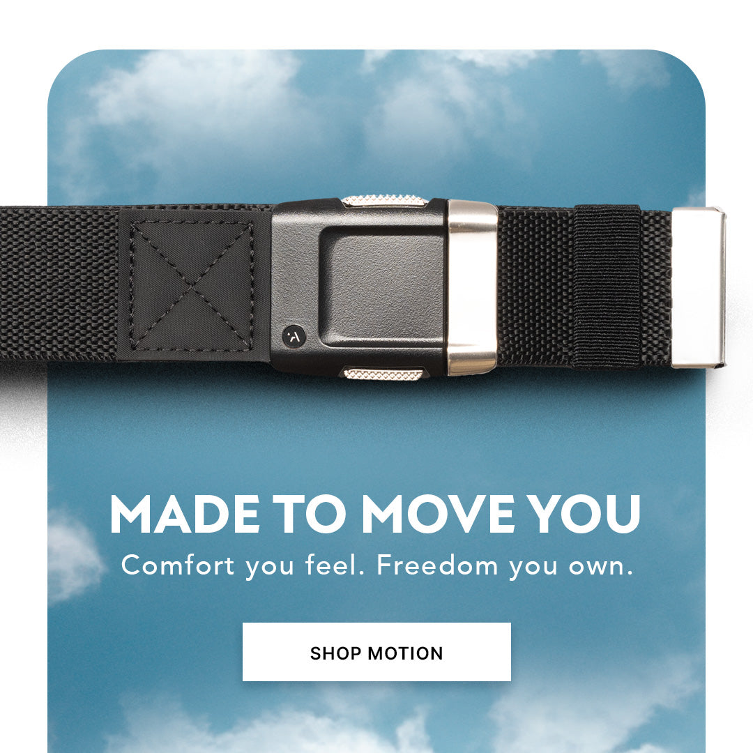 A black fabric belt with a silver buckle is displayed against a sky with clouds. Text below the belt reads, MADE TO MOVE YOU. Comfort you feel. Freedom you own. There is also a button labeled SHOP MOTION.