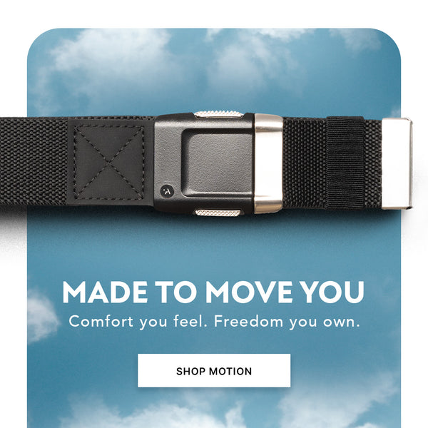 A black fabric belt with a silver buckle is displayed against a sky with clouds. Text below the belt reads, MADE TO MOVE YOU. Comfort you feel. Freedom you own. There is also a button labeled SHOP MOTION.