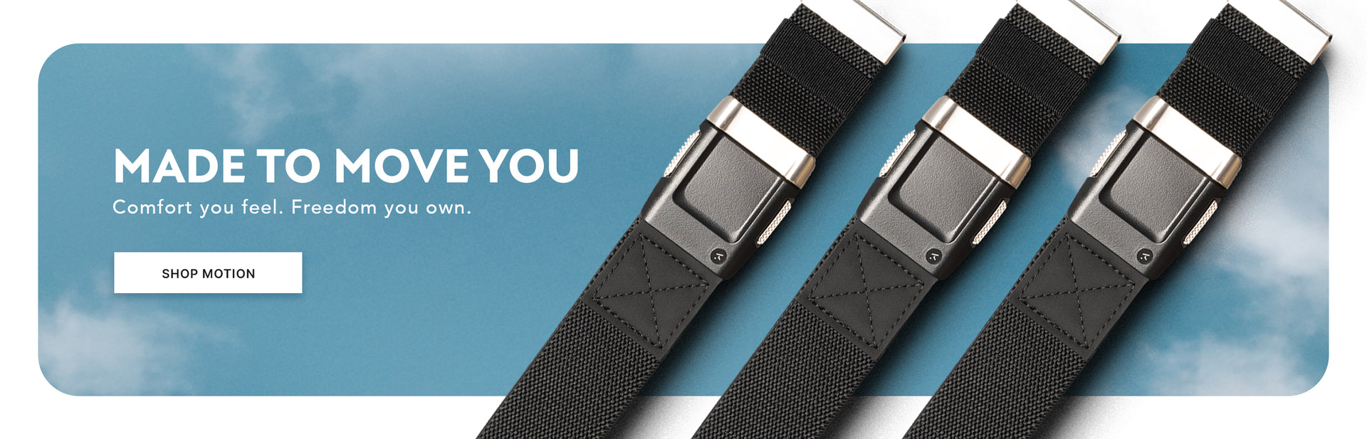 Three black belts with silver buckles are displayed diagonally next to text that reads “Made to Move You. Comfort you feel. Freedom you own.” A “Shop Motion” button is on a blue sky background.
