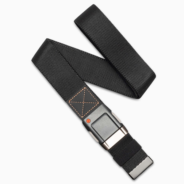 The Arcade Belts Motion belt in Black Flame features a metal buckle, orange stitching, and a textured black fabric. Laid out on a white background, it offers a comfortable fit and modern style.