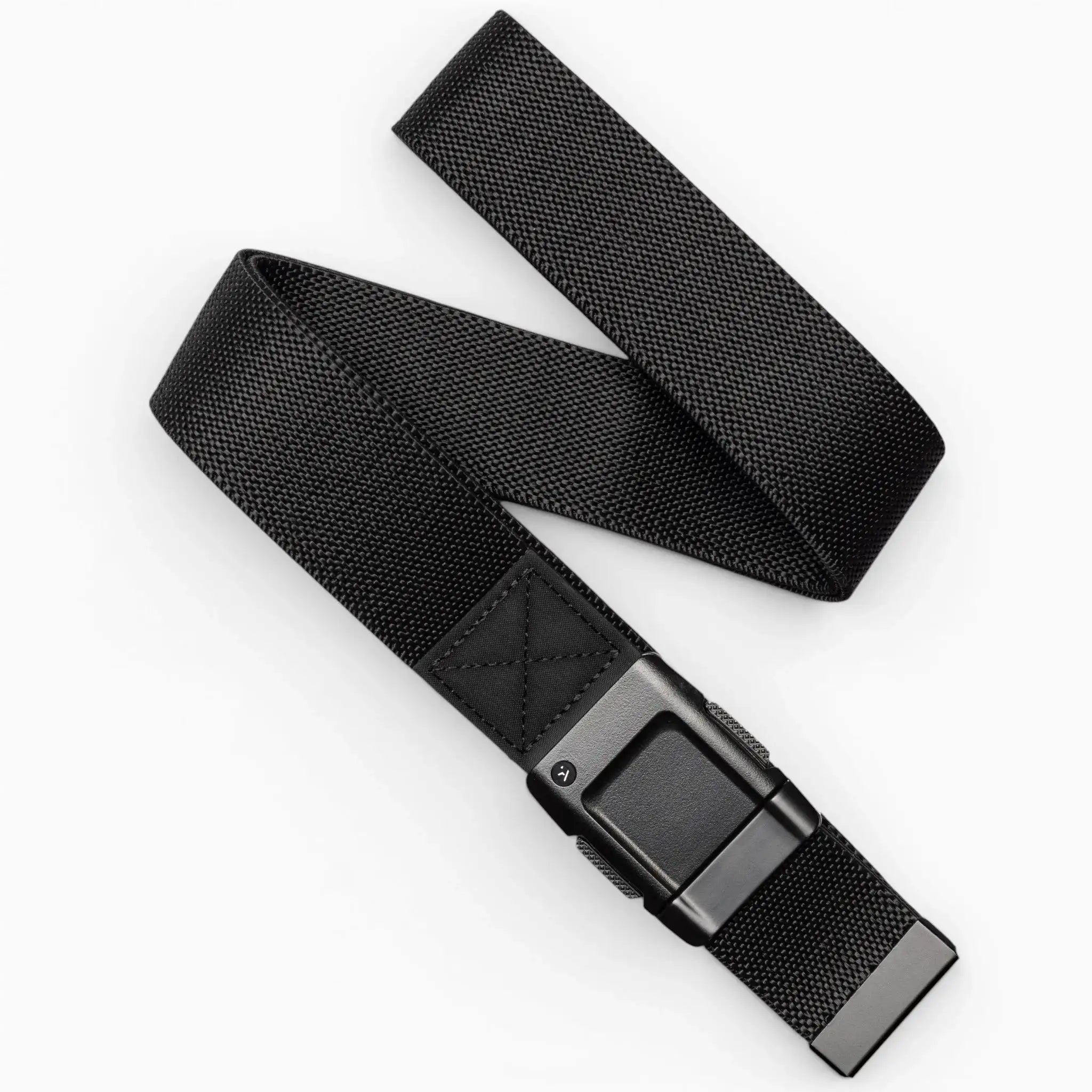 The Arcade Belts Motion is a black woven fabric belt with a rectangular black buckle, pictured loosely coiled on a white background—offering modern style and everyday comfort.