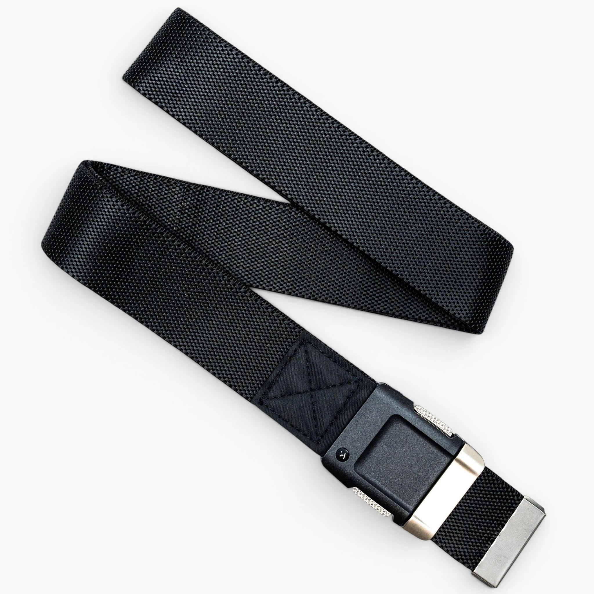 The Arcade Belts Motion is a black stretch webbing low-profile belt with a silver metal tip and a rectangular black metal buckle, shown on a white background.