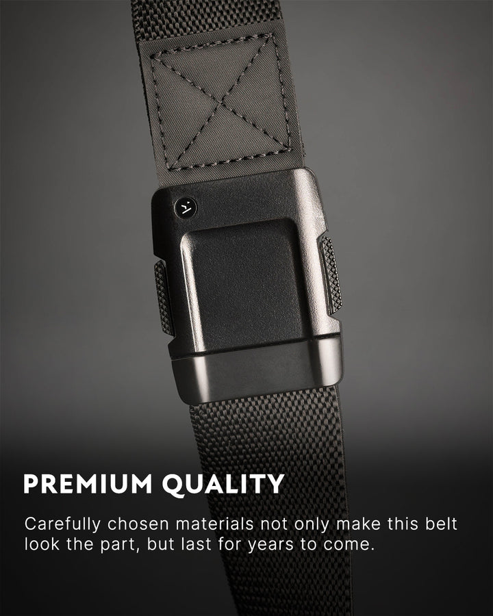 Close-up of a gray Elastic Stretch Belt with a sturdy metal buckle against a dark background, featuring the text Premium Quality and highlighting the belt’s durability and high-quality stretch webbing material.