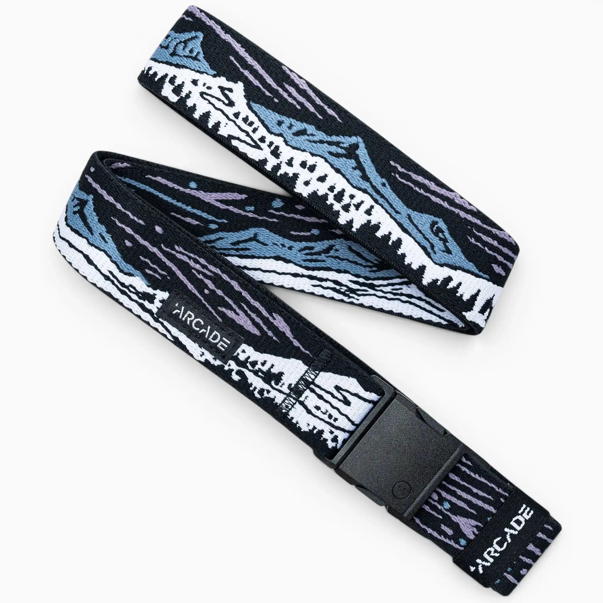 The Out of Range fabric Elastic Stretch Belt by Arcade Belts features a mountain landscape in blue, white, black, and purple tones with a black plastic buckle. Arcade is printed in white on the belt near the buckle.