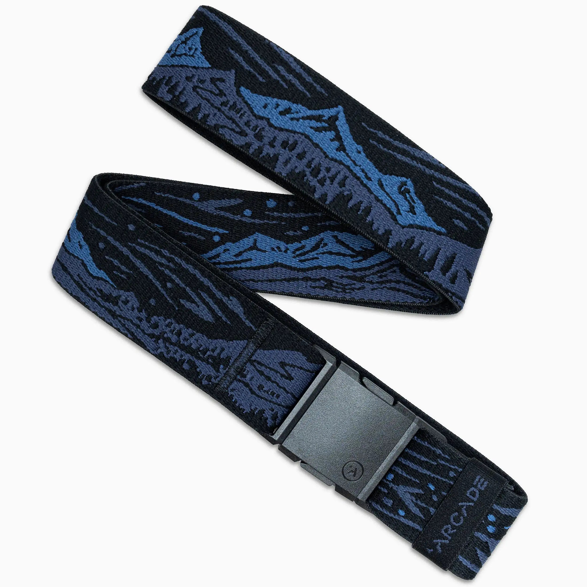 The Arcade Belts Out of Range Kit is a blue and black fabric belt with a mountain design, black rectangular buckle, stretch webbing for comfort, and ARCADE visible on the end.