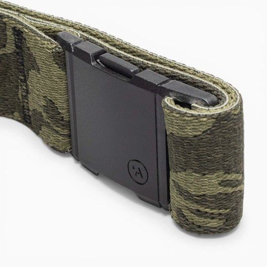 A close-up of the Roark x Arcade adventure belt by Arcade Belts, featuring a camouflage pattern and a black rectangular buckle, set against a white background.