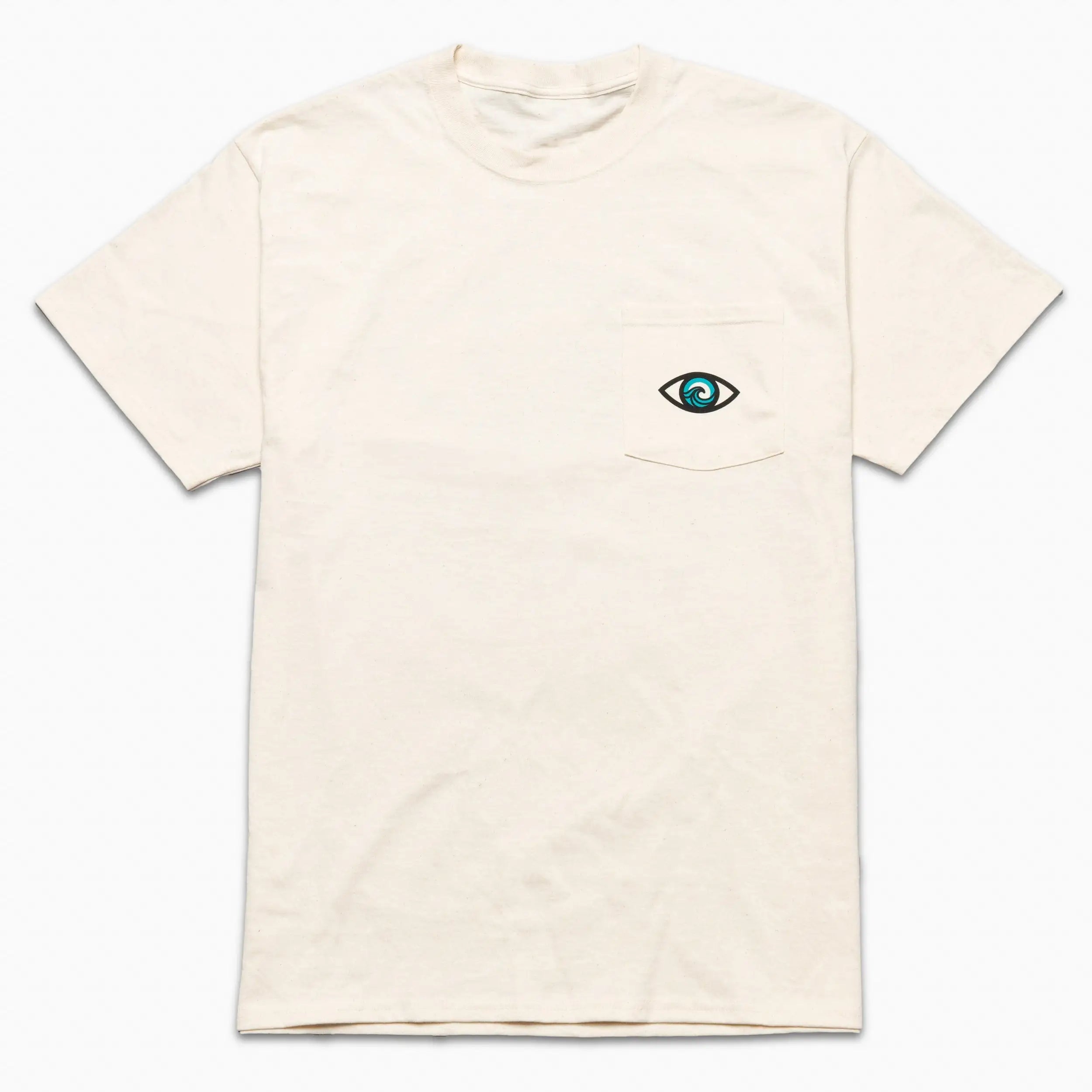 The Arcade Freedom Tee by Arcade Belts is a plain off-white shirt with a small chest pocket featuring an embroidered blue and black eye, perfect for pairing with travel belts or stretch webbing accessories.