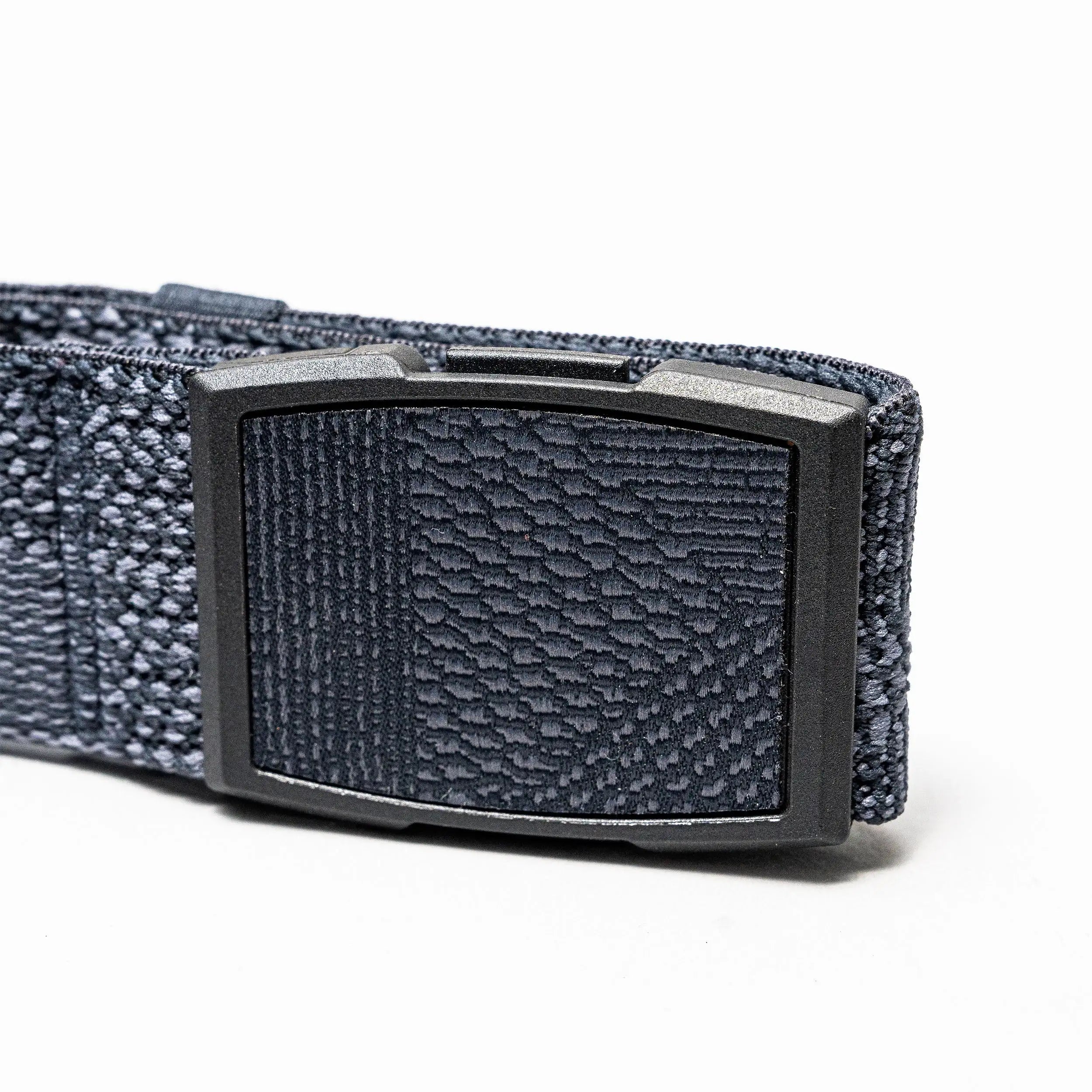 A close-up of the Arcade Belts Skyline, a dark blue stretch webbing belt with a rectangular black plastic buckle, displayed on a white background.