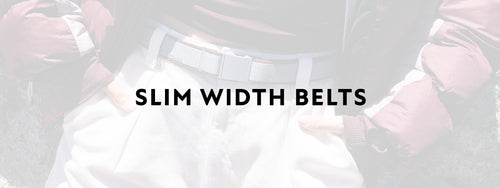 A person wearing light-colored pants and a slim belt stands with hands in pockets. The words “SLIM WIDTH BELTS” are boldly displayed across the image.