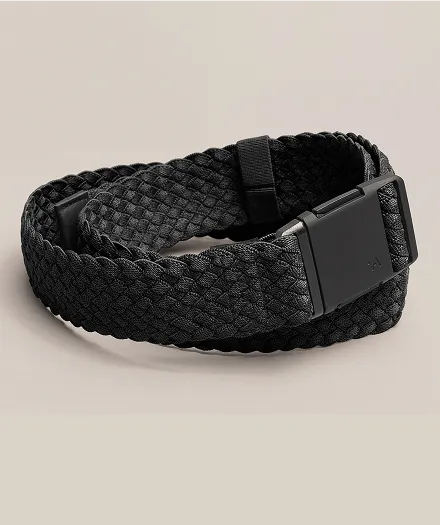 A black braided belt with a rectangular black buckle, neatly rolled and placed on a light beige background.